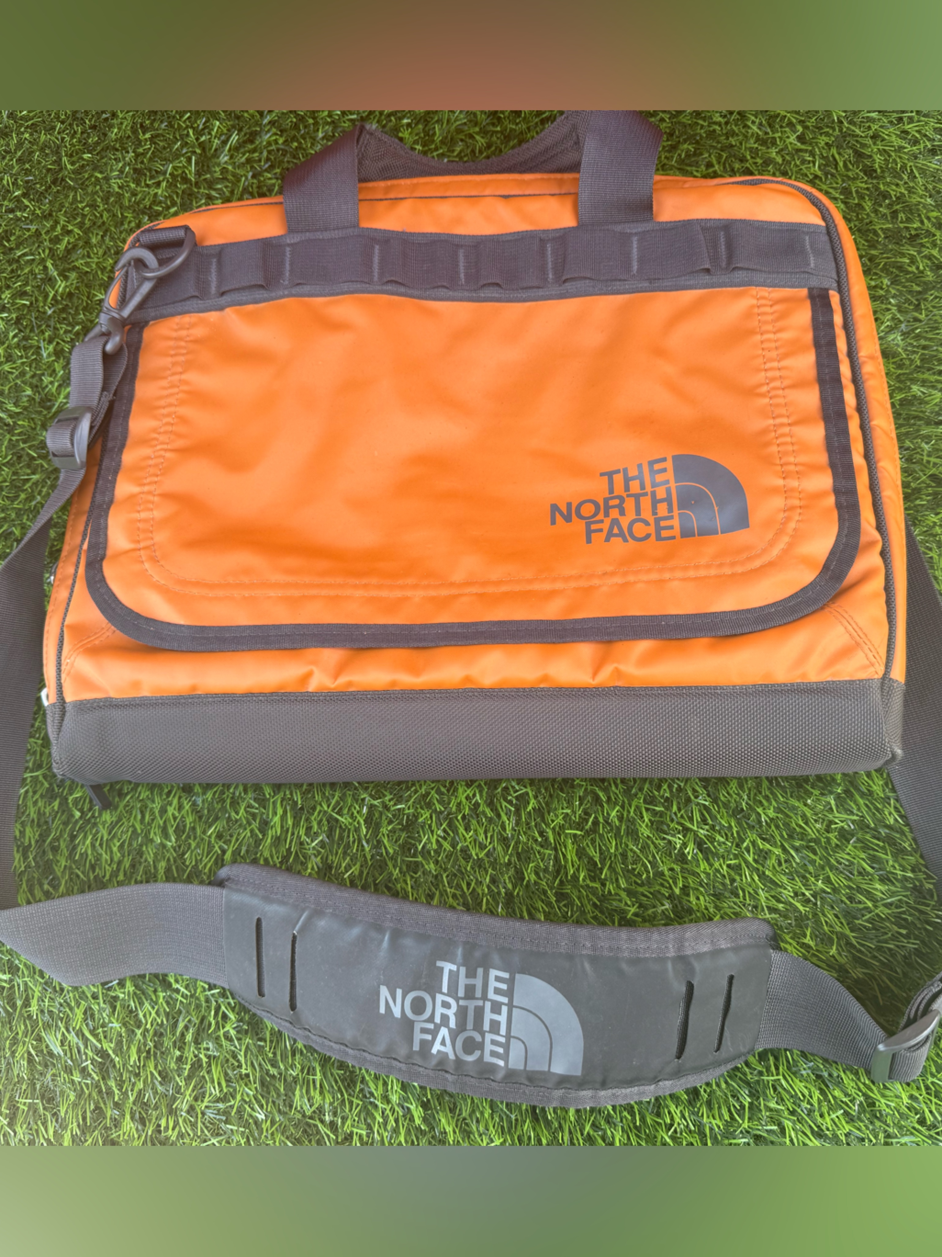 The North Face Orange And Black Messenger Bag